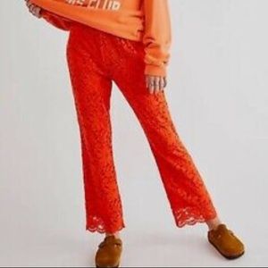NWOT Free People wild laces pull on crop flare pants in audacious red. Size SP